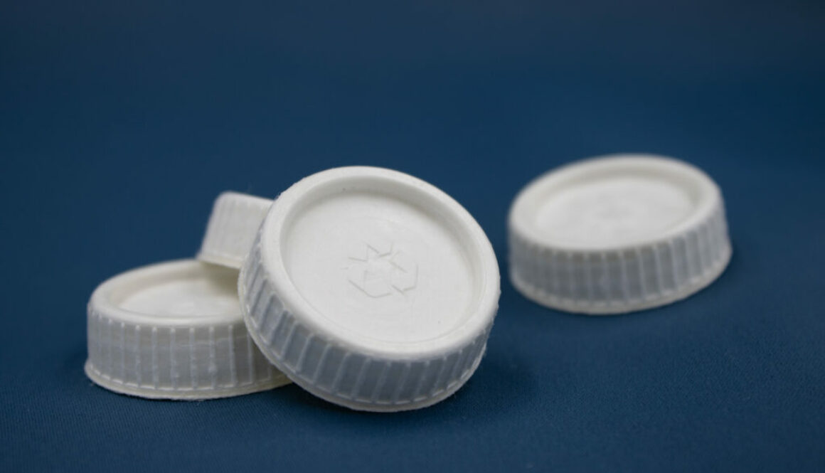 Recyclable as paper over-cap
