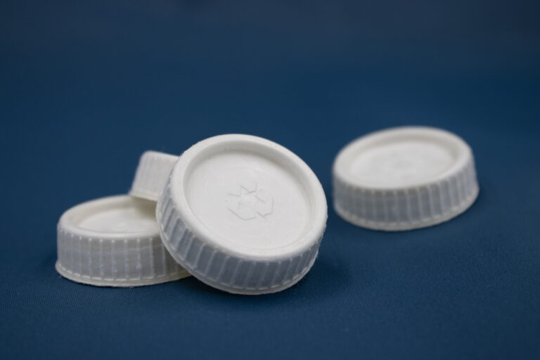 Recyclable as paper over-cap